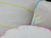 Linen pillows with bright piping